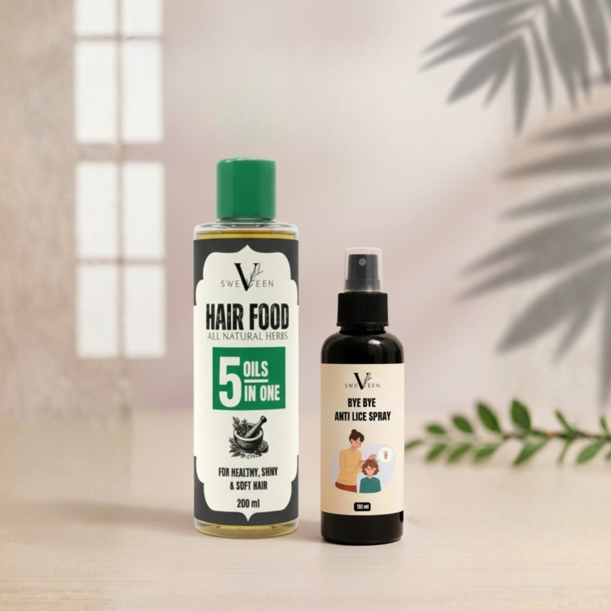 Two hair care products from Ewe Vein on a neutral background with a plant leaf.