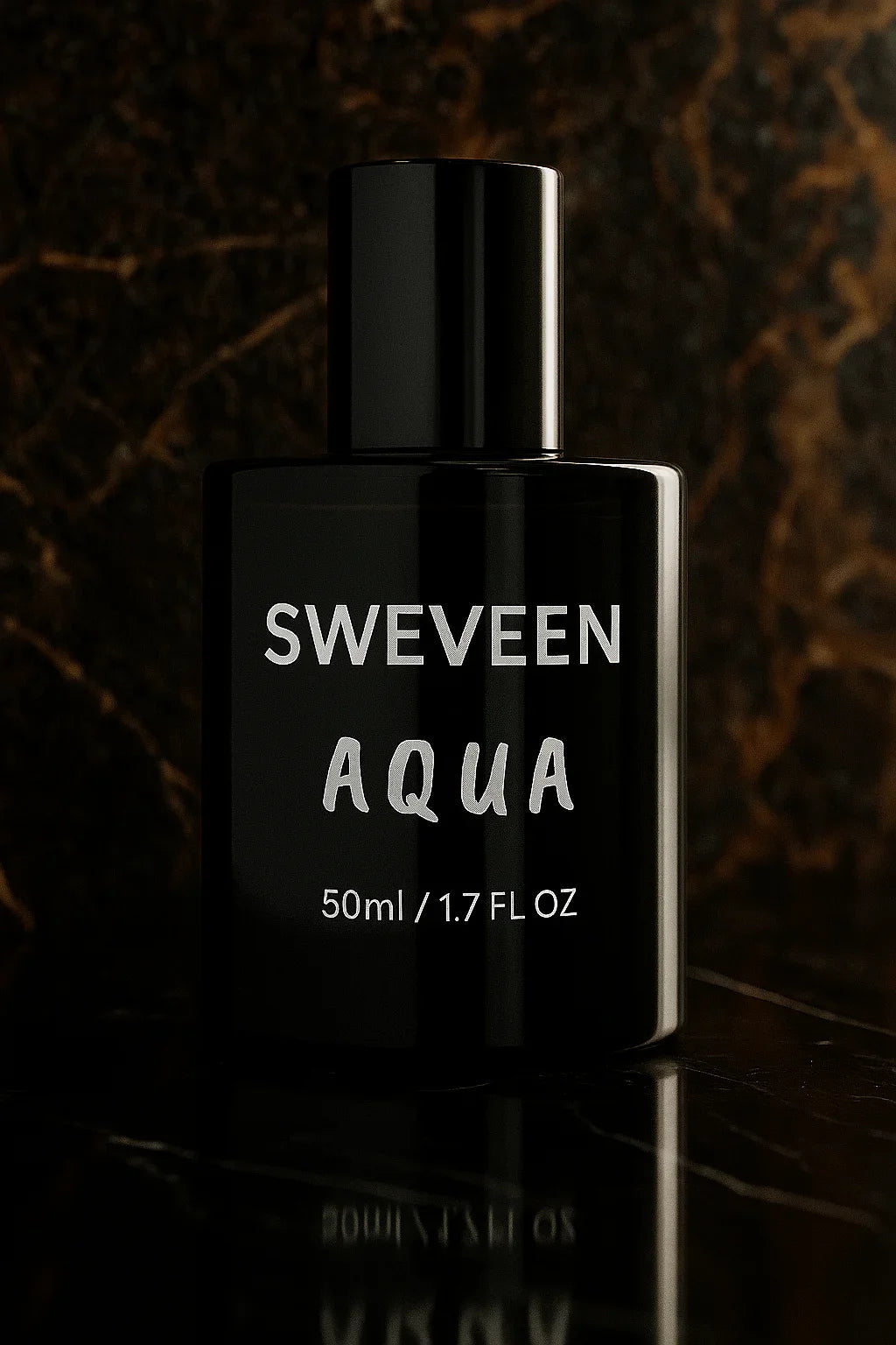 Black perfume bottle with silver lettering and reflection.