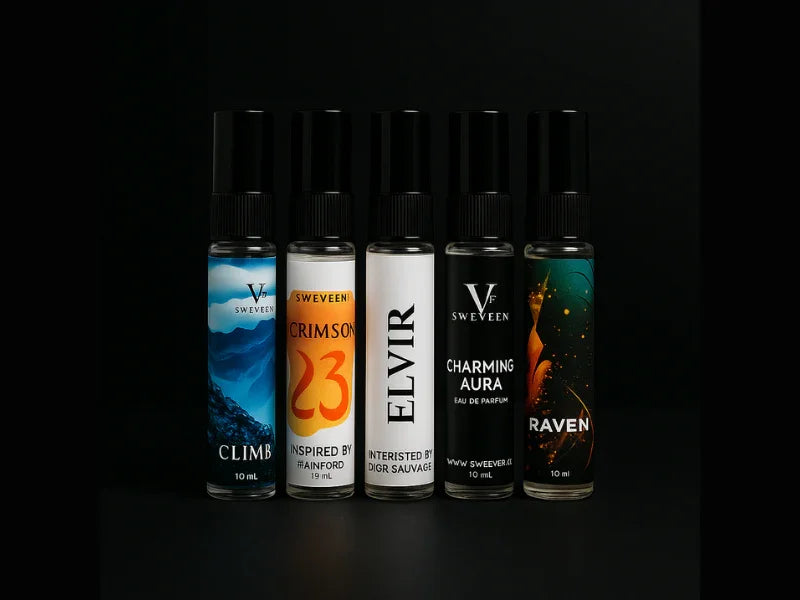 Five bottles of perfume against a black background.