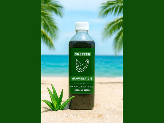 A bottle of Sweveen Alovera Oil on a sandy beach.