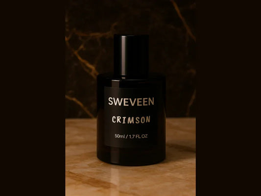 Black perfume bottle with a label that says "Sweveen Crimson." 
